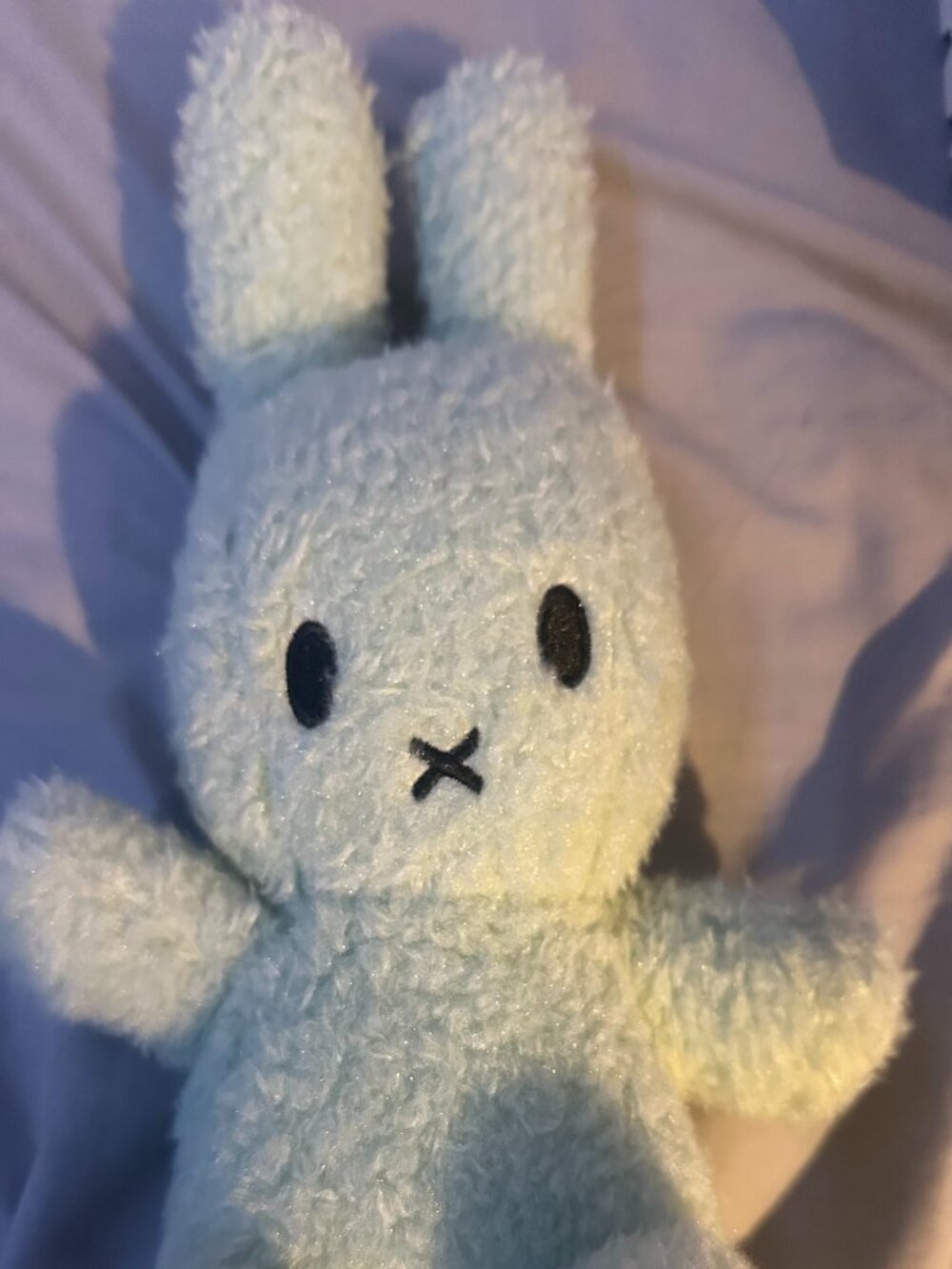 light green rabbit plushie